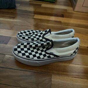 Checkered slip-on vans. W 7.5